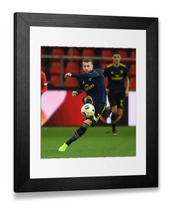 Framed Print : Arsenal's Calum Chambers in Action against Standard Liege in UEFA Europa League Group F