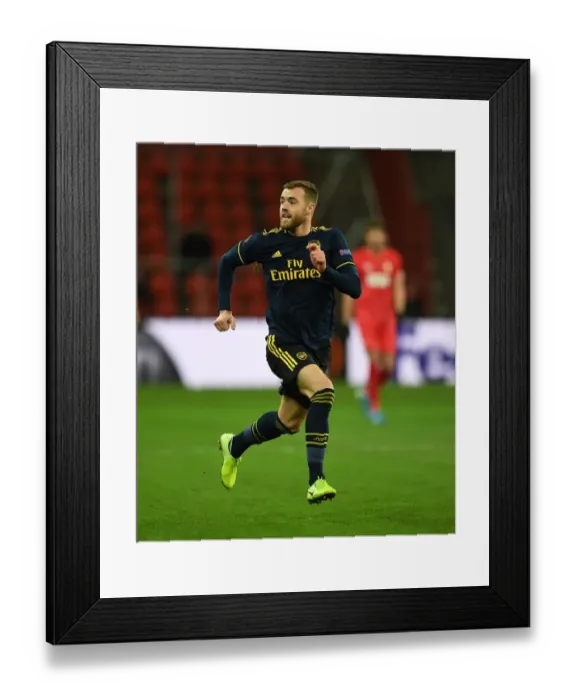 Framed Print : Arsenal's Calum Chambers in Action: Standard Liege vs. Arsenal, UEFA Europa League (December 2019)