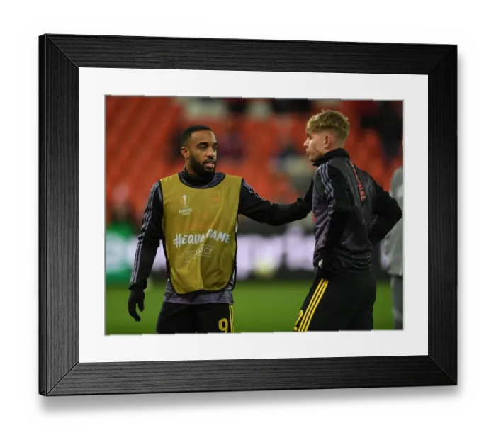 Framed Print : Arsenal's Lacazette and Smith Rowe Discuss Tactics Before Standard Liege Clash (UEFA Europa League, 2019-20)