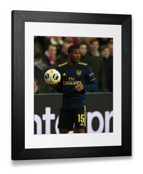 Framed Print : Arsenal's Ainsley Maitland-Niles in UEFA Europa League Action against Standard Liege (December 2019)