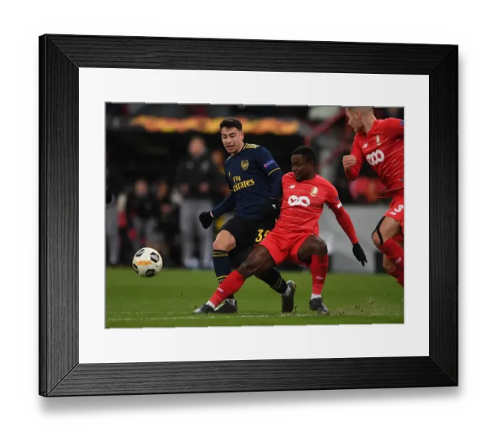 Framed Print : Martinelli Faces Pressure: Arsenal vs. Standard Liege, UEFA Europa League (December 2019)