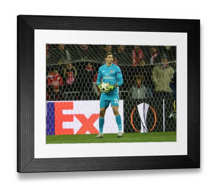 Framed Print : Arsenal's Emi Martinez in Action against Standard Liege in UEFA Europa League Group F Framed Print : Arsenal's Emi Martinez in Action against Standard Liege in UEFA Europa League Group F