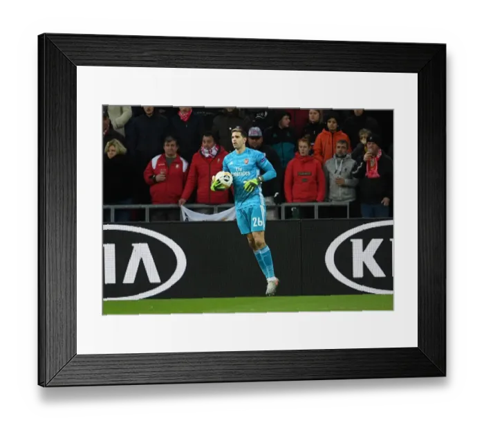Framed Print : Emi Martinez in Action: Arsenal's Goalkeeper Shines in UEFA Europa League Clash against Standard Liege (December 2019) Framed Print : Emi Martinez in Action: Arsenal's Goalkeeper Shines in UEFA Europa League Clash against Standard Liege (December 2019)