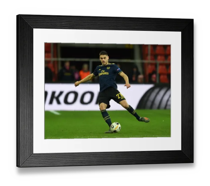 Framed Print : Arsenal's Mavropanos in Action: Standard Liege vs. Arsenal, UEFA Europa League (December 2019)