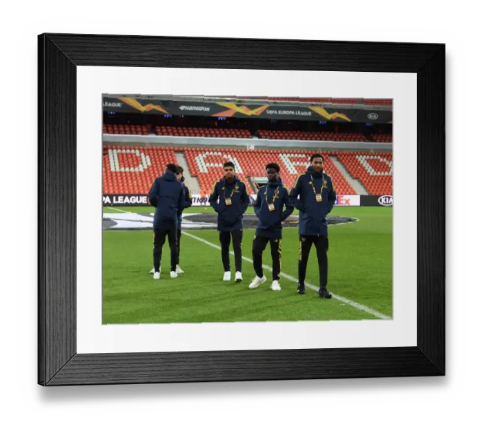 Framed Print : Arsenal Players Inspect Standard Liege's Pitch Ahead of UEFA Europa League Match Framed Print : Arsenal Players Inspect Standard Liege's Pitch Ahead of UEFA Europa League Match