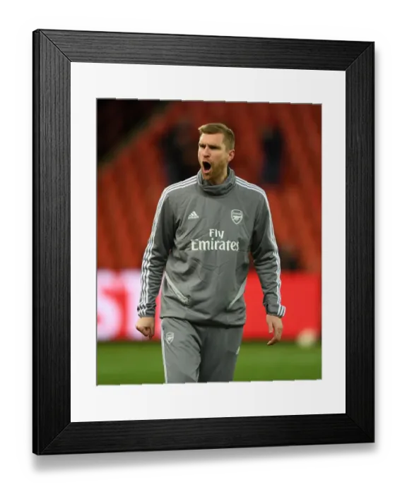 Framed Print : Mertesacker Coaches Arsenal in UEFA Europa League Match against Standard Liege