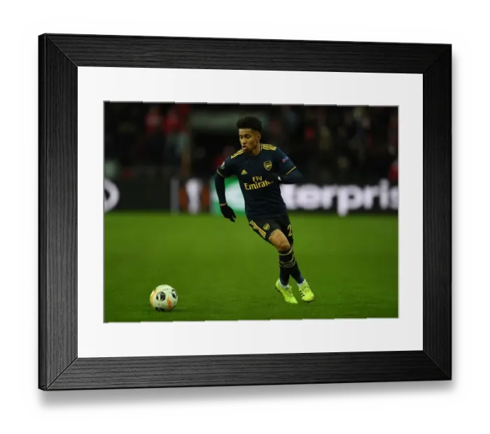 Framed Print : Arsenal's Reiss Nelson in Action against Standard Liege in UEFA Europa League (December 2019)