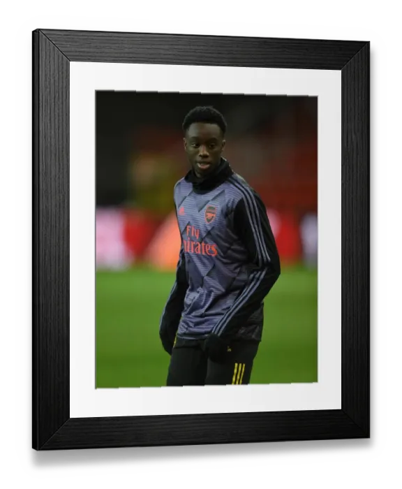 Framed Print : Arsenal's James Olayinka Prepares for Standard Liege Clash in Europa League Group Stage Framed Print : Arsenal's James Olayinka Prepares for Standard Liege Clash in Europa League Group Stage