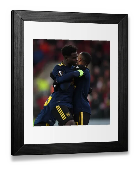 Framed Print : Arsenal's Bukayo Saka and Alexandre Lacazette Celebrate Goals in Standard Liege Victory, UEFA Europa League 2019-20 Framed Print : Arsenal's Bukayo Saka and Alexandre Lacazette Celebrate Goals in Standard Liege Victory, UEFA Europa League 2019-20