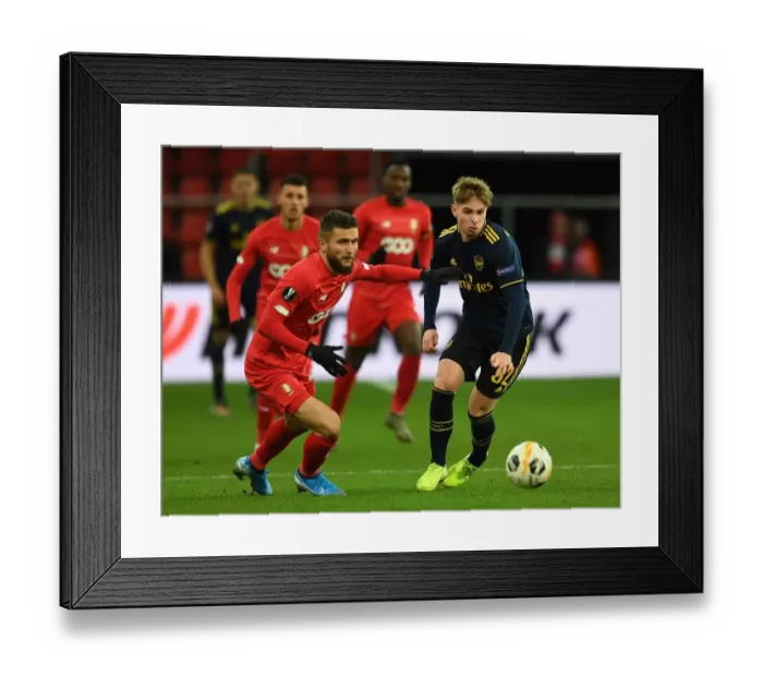 Framed Print : Emile Smith Rowe Clashes with Nicolas Gavory in Standard Liege vs Arsenal UEFA Europa League Match