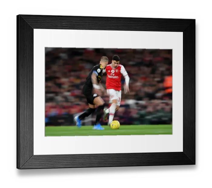 Framed Print : Arsenal's Martinelli Clashes with Manchester City's Walker in Premier League Showdown