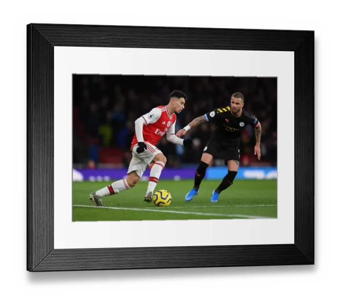 Framed Print : Arsenal vs Manchester City: Gabriel Martinelli Under Pressure Framed Print : Arsenal vs Manchester City: Gabriel Martinelli Under Pressure