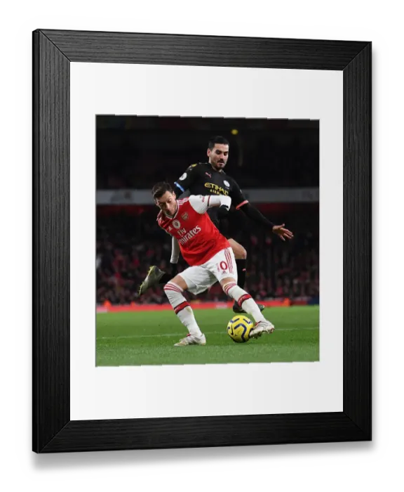 Framed Print : Arsenal vs Manchester City: Ozil Under Pressure in Intense Premier League Clash Framed Print : Arsenal vs Manchester City: Ozil Under Pressure in Intense Premier League Clash