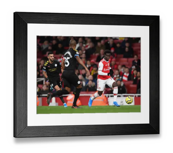Framed Print : Arsenal's Bukayo Saka Faces Manchester City in the Premier League