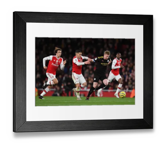 Framed Print : Arsenal vs Manchester City: Clash of Titans in the Premier League Framed Print : Arsenal vs Manchester City: Clash of Titans in the Premier League