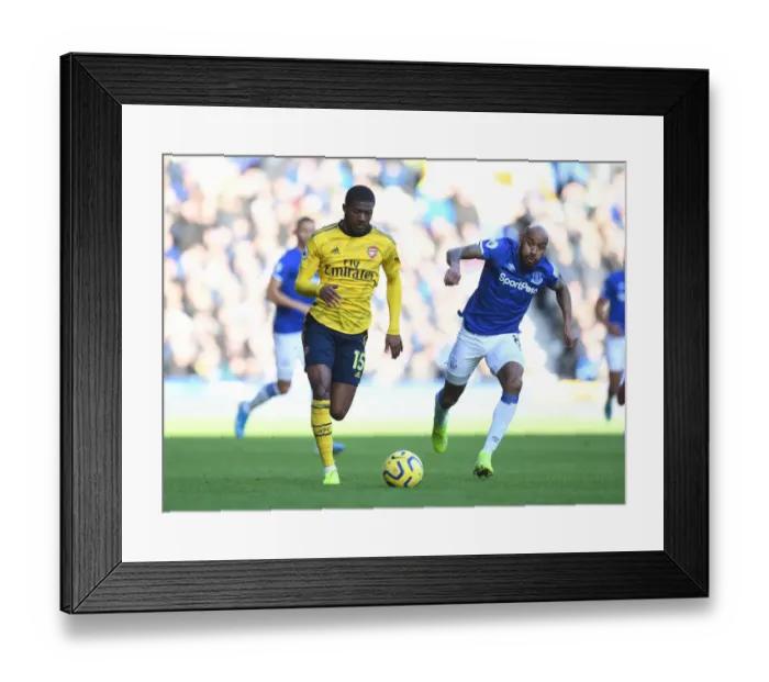 Framed Print : Maitland-Niles vs. Delph: A Fierce Rivalry Unfolds in Everton vs. Arsenal Premier League Clash Framed Print : Maitland-Niles vs. Delph: A Fierce Rivalry Unfolds in Everton vs. Arsenal Premier League Clash