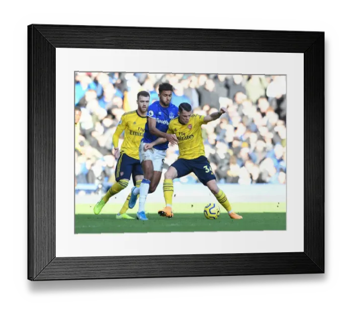 Framed Print : Xhaka vs Calvert-Lewin: Intense Battle at Goodison Park - Everton vs Arsenal, Premier League 2019-20