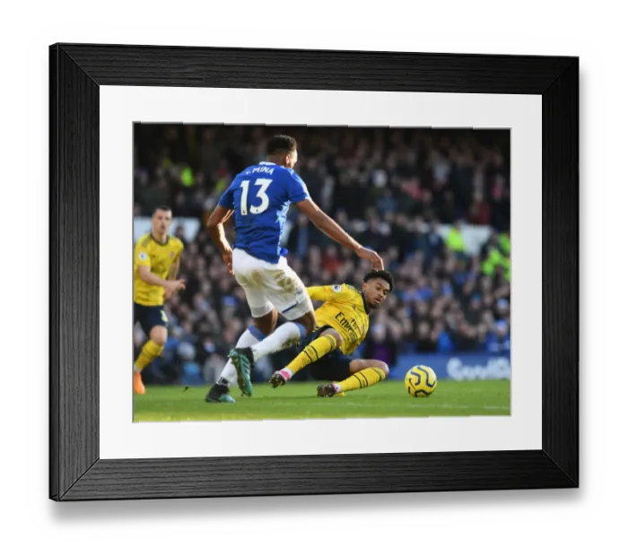 Framed Print : Reiss Nelson vs Yerry Mina: Intense Battle at Goodison Park - Everton vs Arsenal, Premier League 2019-20