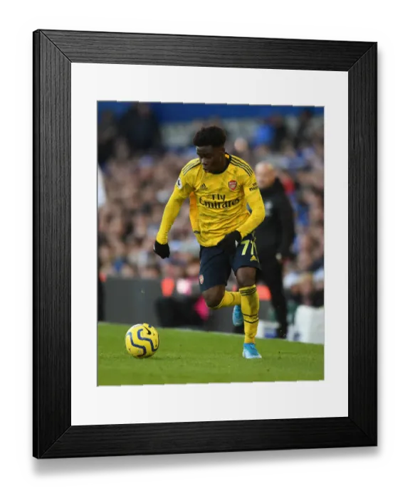 Framed Print : Bukayo Saka in Action: Everton vs Arsenal, Premier League 2019-20