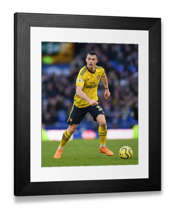 Framed Print : Granit Xhaka in Action: Everton vs Arsenal, Premier League 2019-20 Framed Print : Granit Xhaka in Action: Everton vs Arsenal, Premier League 2019-20