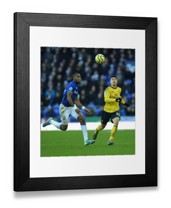 Framed Print : Everton vs Arsenal: Martinelli vs Sidibe Battle in Premier League Clash