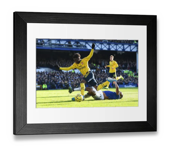 Framed Print : Saka vs Mina: Intense Battle at Goodison Park - Everton vs Arsenal, Premier League 2019-20