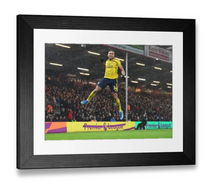 Framed Print : Aubameyang Scores: Arsenal Triumphs Over AFC Bournemouth in Premier League Clash