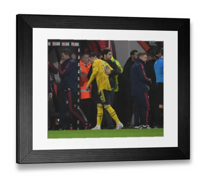Framed Print : Arsenal's Mikel Arteta Embraces Mesut Ozil During AFC Bournemouth Clash (Premier League 2019-20)
