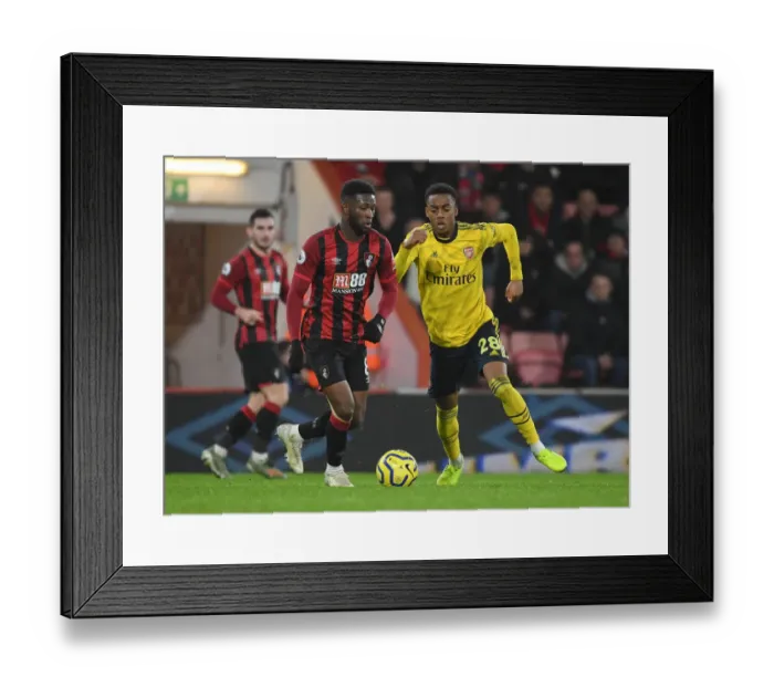 Framed Print : Clash at Vitality: Arsenal's Willock Tackles Bournemouth's Lerma in Premier League Showdown