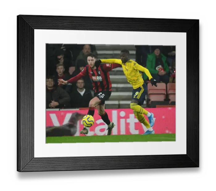 Framed Print : Pepe vs Simpson: Intense Clash in AFC Bournemouth vs Arsenal FC Premier League Match