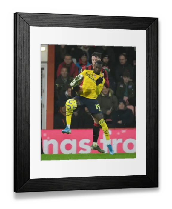 Framed Print : Pepe vs Simpson: Intense Clash in the Premier League - AFC Bournemouth vs Arsenal FC (December 2019) Framed Print : Pepe vs Simpson: Intense Clash in the Premier League - AFC Bournemouth vs Arsenal FC (December 2019)