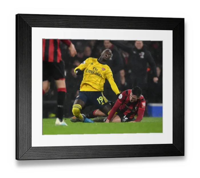 Framed Print : Pepe Foul: Nicolas Pepe Victimized by Lewis Cook in AFC Bournemouth vs. Arsenal FC (December 2019) Framed Print : Pepe Foul: Nicolas Pepe Victimized by Lewis Cook in AFC Bournemouth vs. Arsenal FC (December 2019)