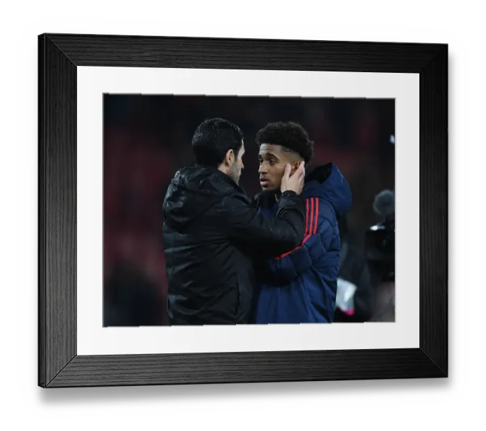 Framed Print : Mikel Arteta Comforts Reiss Nelson: A Moment of Consolation after AFC Bournemouth vs Arsenal (Premier League 2019-20) Framed Print : Mikel Arteta Comforts Reiss Nelson: A Moment of Consolation after AFC Bournemouth vs Arsenal (Premier League 2019-20)