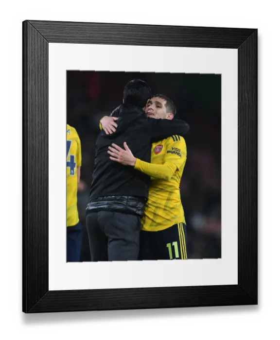 Framed Print : Arsenal's Mikel Arteta Embraces Lucas Torreira Amidst AFC Bournemouth Clash (2019-20) Framed Print : Arsenal's Mikel Arteta Embraces Lucas Torreira Amidst AFC Bournemouth Clash (2019-20)