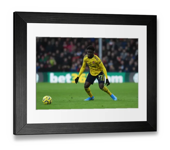 Framed Print : Bukayo Saka in Action: AFC Bournemouth vs. Arsenal FC, Premier League 2019-20