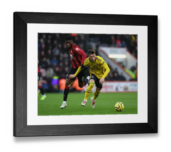 Framed Print : Mesut Ozil vs. Jefferson Lerma: Battle in the Premier League - AFC Bournemouth vs. Arsenal FC (December 2019)