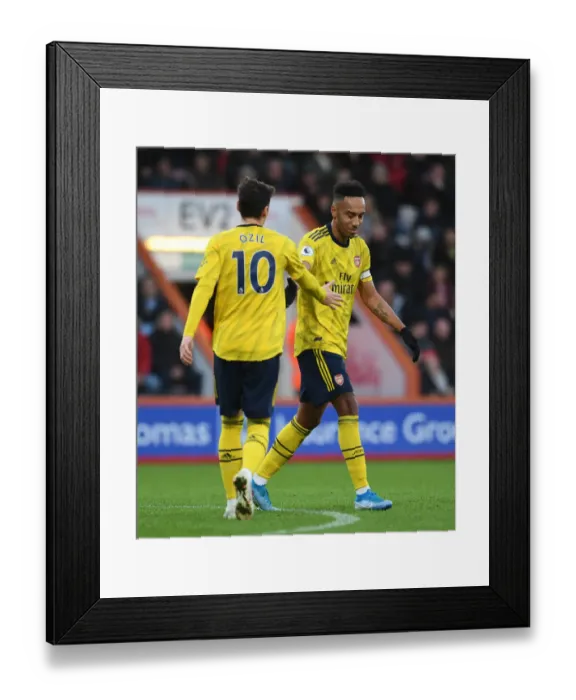 Framed Print : Arsenal: Ozil and Aubameyang Celebrate Together in AFC Bournemouth Clash (2019-20) Framed Print : Arsenal: Ozil and Aubameyang Celebrate Together in AFC Bournemouth Clash (2019-20)