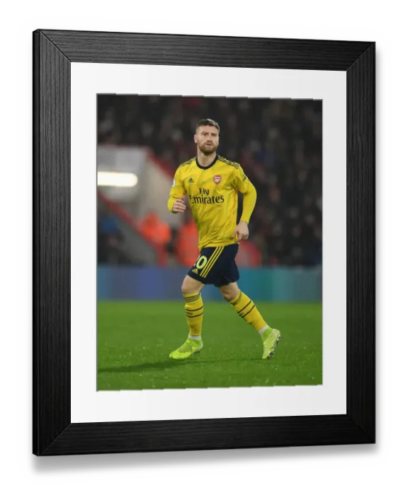 Framed Print : Arsenal's Mustafi Faces Off Against AFC Bournemouth in Premier League Clash (2019-20) Framed Print : Arsenal's Mustafi Faces Off Against AFC Bournemouth in Premier League Clash (2019-20)
