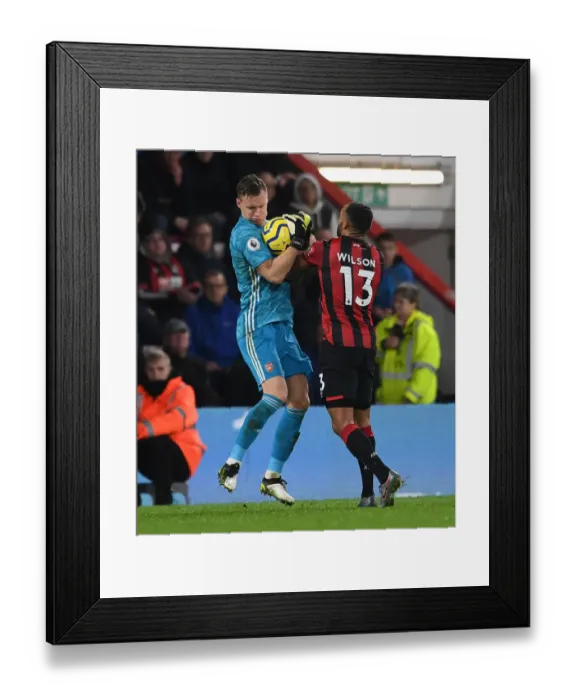 Framed Print : AFC Bournemouth vs. Arsenal: Intense Clash Between Callum Wilson and Bernd Leno Framed Print : AFC Bournemouth vs. Arsenal: Intense Clash Between Callum Wilson and Bernd Leno
