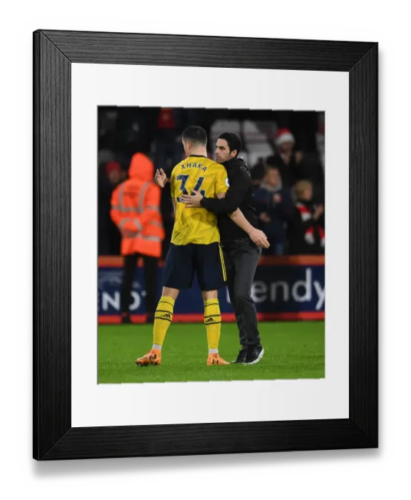 Framed Print : Arsenal's Mikel Arteta and Granit Xhaka Celebrate Victory over AFC Bournemouth (December 2019)