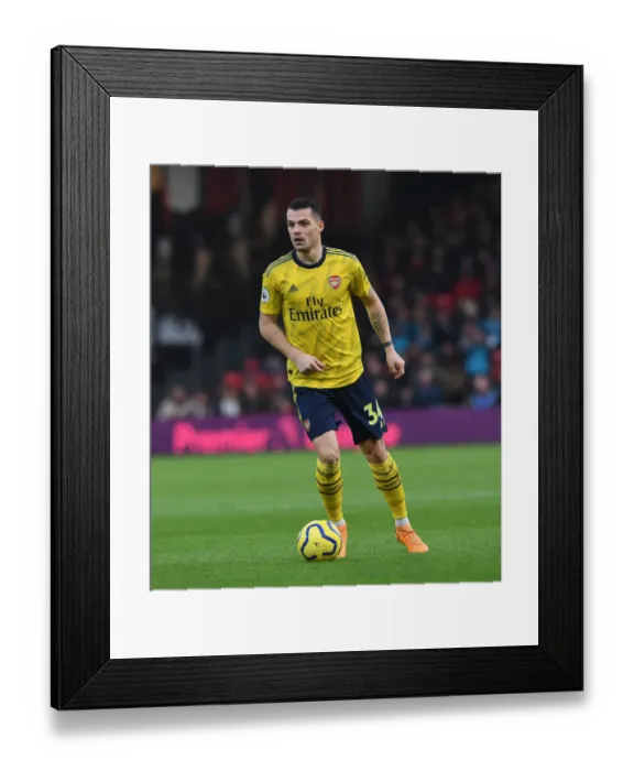 Framed Print : Granit Xhaka in Action: AFC Bournemouth vs. Arsenal FC, Premier League 2019-20 Framed Print : Granit Xhaka in Action: AFC Bournemouth vs. Arsenal FC, Premier League 2019-20