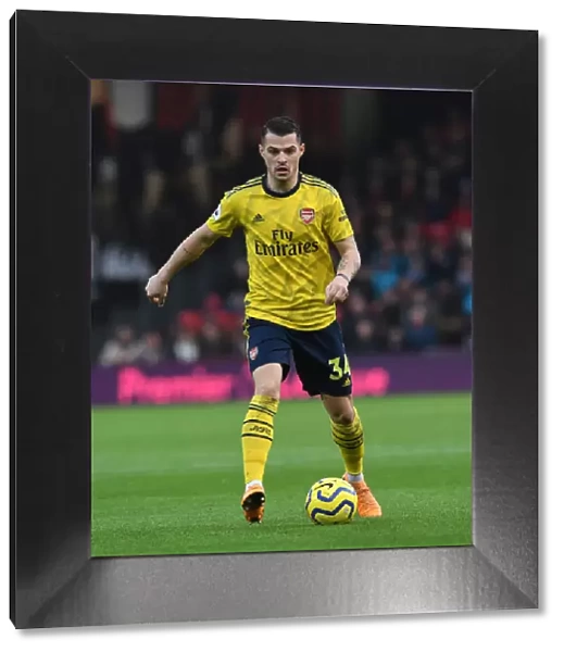 Granit Xhaka: Arsenal's Midfield Maestro in Action Against AFC Bournemouth (Premier League 2019-20)