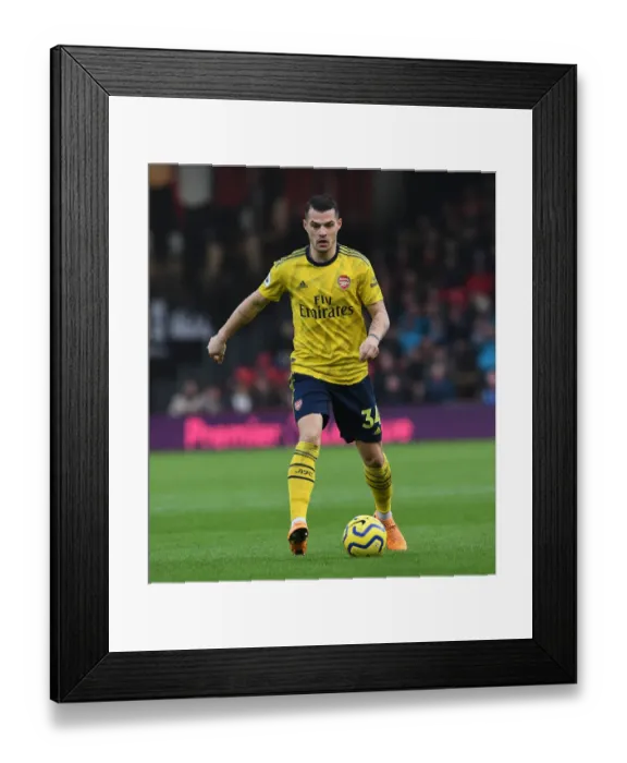 Framed Print : Granit Xhaka: Arsenal's Midfield Maestro in Action Against AFC Bournemouth (Premier League 2019-20) Framed Print : Granit Xhaka: Arsenal's Midfield Maestro in Action Against AFC Bournemouth (Premier League 2019-20)