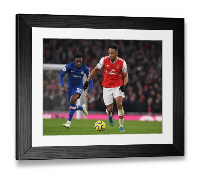 Framed Print : Arsenal's Aubameyang Outmaneuvers Chelsea's Hudson-Odoi in Premier League Clash Framed Print : Arsenal's Aubameyang Outmaneuvers Chelsea's Hudson-Odoi in Premier League Clash