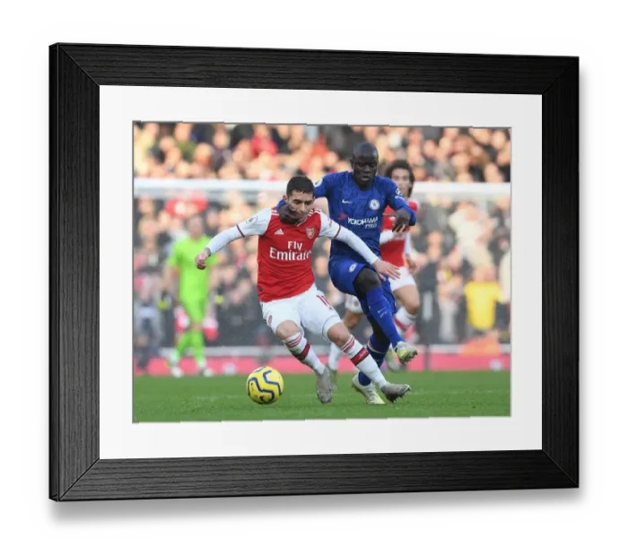 Framed Print : Intense Rivalry: Torreira Fouls Kante in Arsenal vs. Chelsea Clash (2019-20)