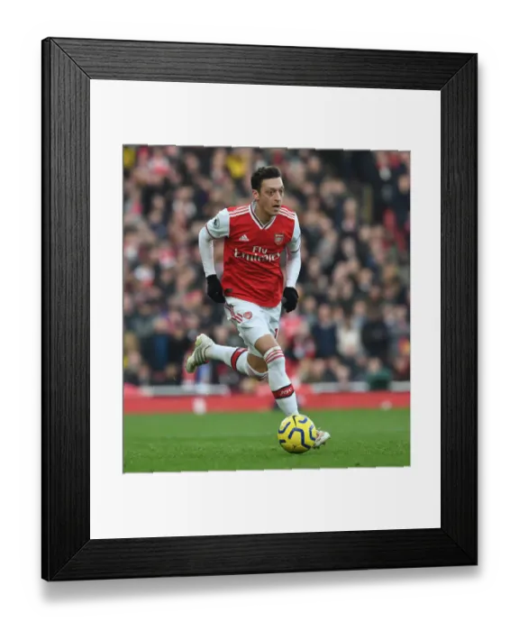 Framed Print : Arsenal vs Chelsea Showdown: Ozil's Premier League Battle at Emirates Stadium (December 2019)
