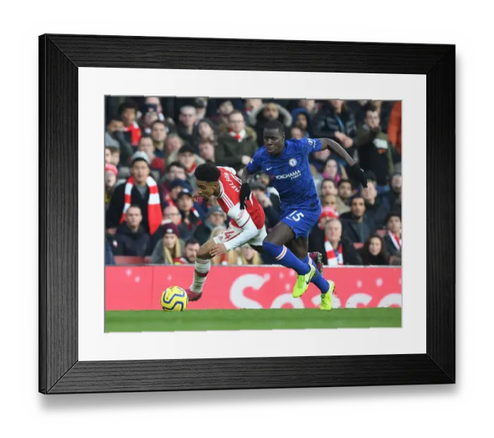 Framed Print : Arsenal vs. Chelsea: A Fierce Battle in the Premier League - Reiss Nelson vs. Kurt Zouma Framed Print : Arsenal vs. Chelsea: A Fierce Battle in the Premier League - Reiss Nelson vs. Kurt Zouma
