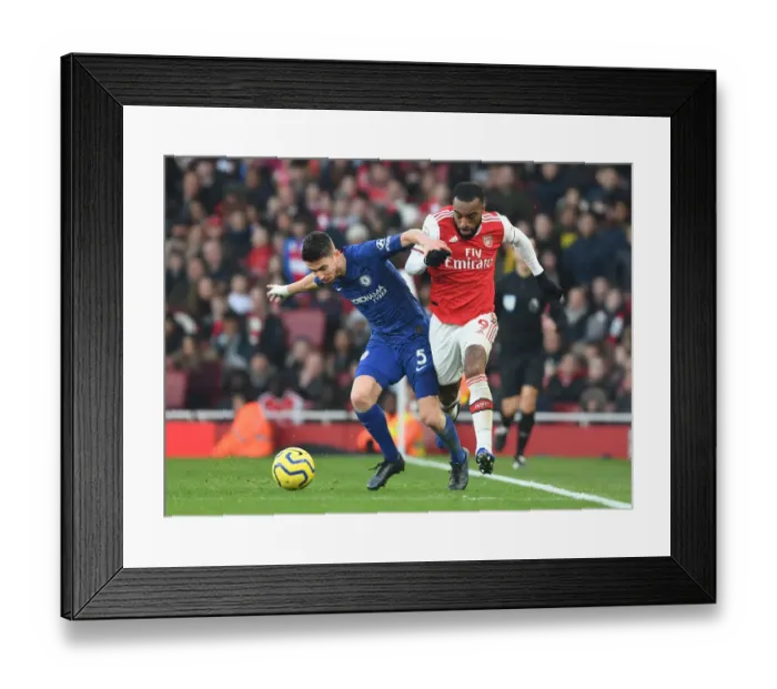 Framed Print : Lacazette vs. Jorginho: A Strategic Showdown in the Arsenal vs. Chelsea Premier League Clash