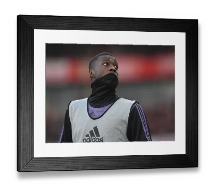 Framed Print : Arsenal's Nicolas Pepe Faces Off Against Chelsea in Premier League Showdown Framed Print : Arsenal's Nicolas Pepe Faces Off Against Chelsea in Premier League Showdown