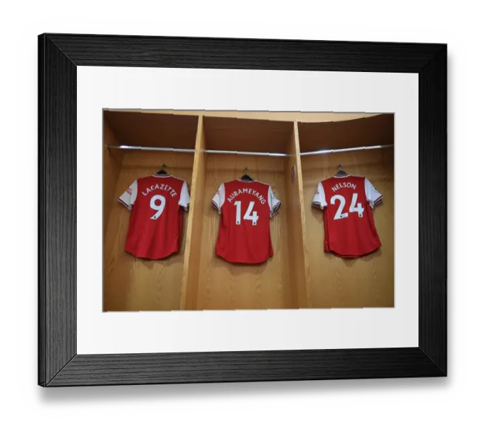 Framed Print : LONDON, ENGLAND - DECEMBER 29: Alex Lacazette, Pierre-Emerick Aubameyang and Reiss Nelson shirts hang in the Arsenal Framed Print : LONDON, ENGLAND - DECEMBER 29: Alex Lacazette, Pierre-Emerick Aubameyang and Reiss Nelson shirts hang in the Arsenal